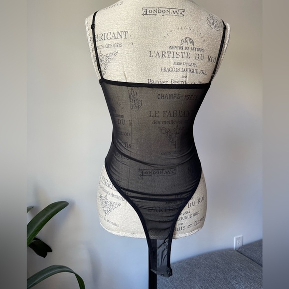 Cute mesh black corset bodysuit
Size: S - Picture 3 of 10